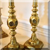 D47. “Good luck” brass candlesticks. 